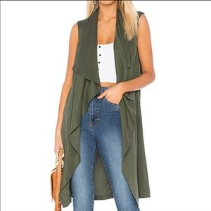 Cupcakes and cashmere duster vest.